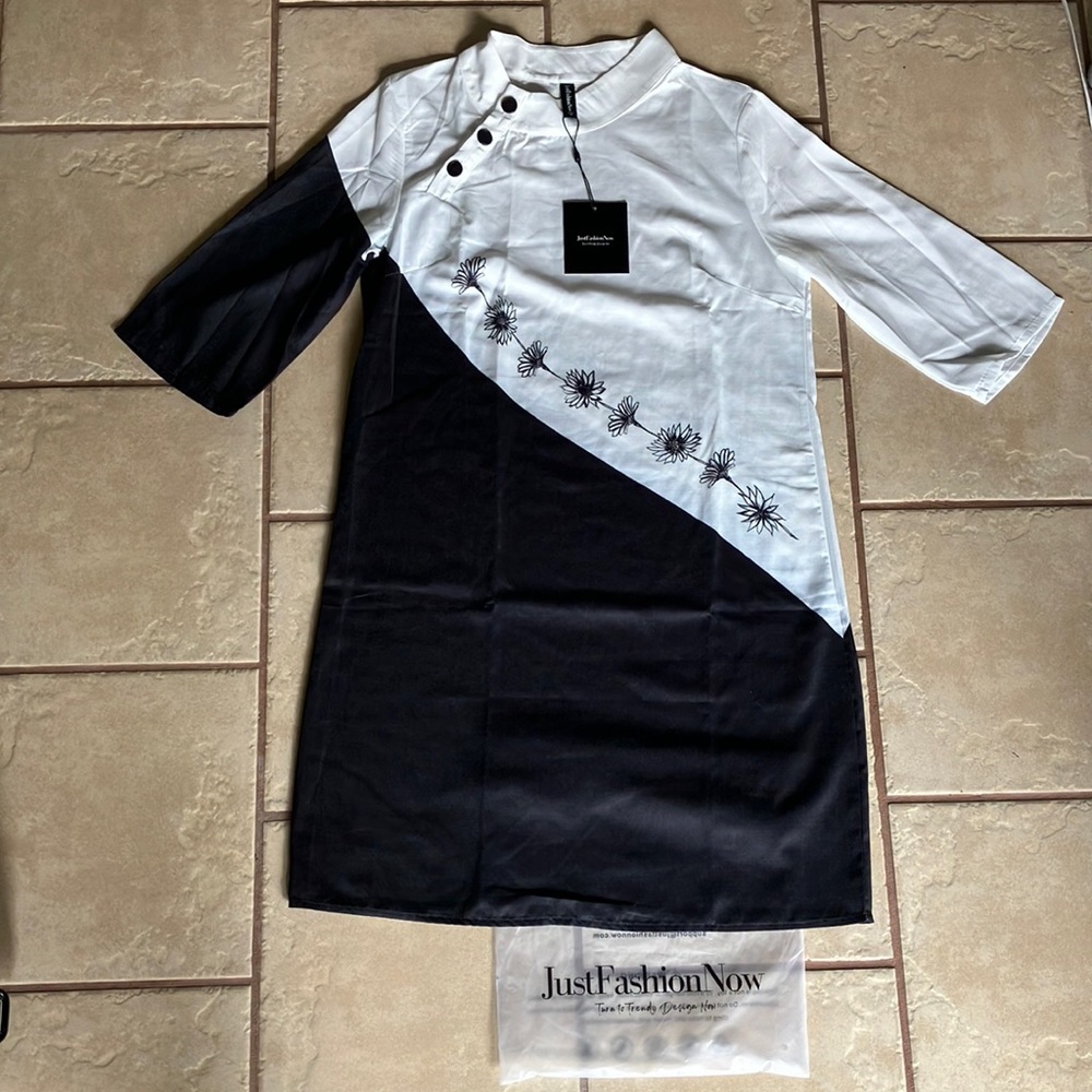 Women’s black and white dress M